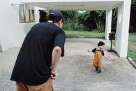 Father Looking at Son Running 