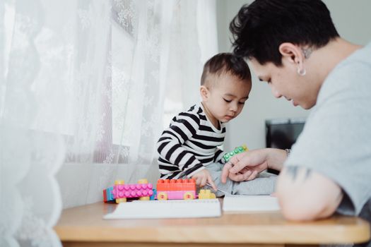parent and child playing
