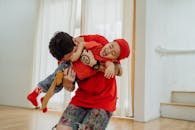 Man Carrying a Child