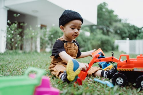 Foto stok gratis anak, bermain, duduk