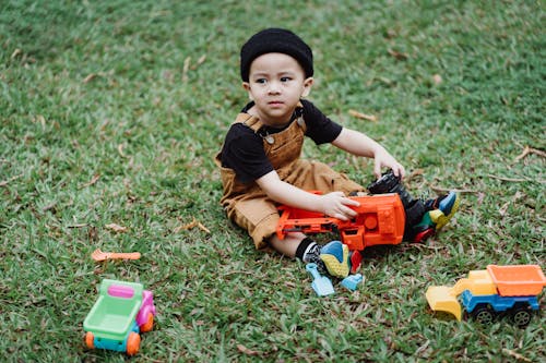 Photos gratuites de chapeau, enfant, être assis