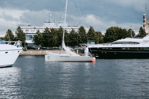 White Sail Boat on Sea