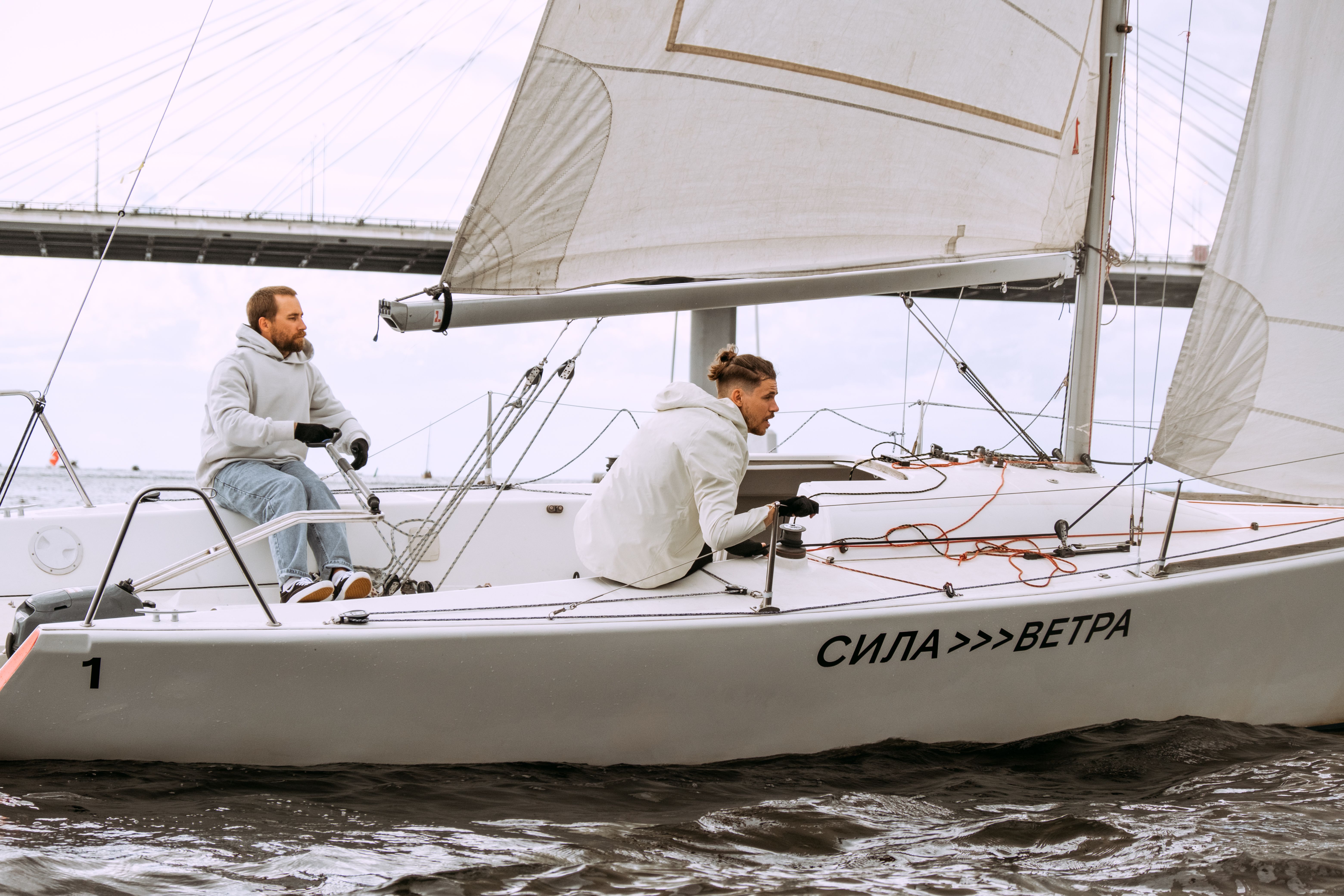 Yacht crew providing service on deck