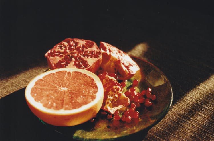 Grapefruit And Pomegranate On Plate