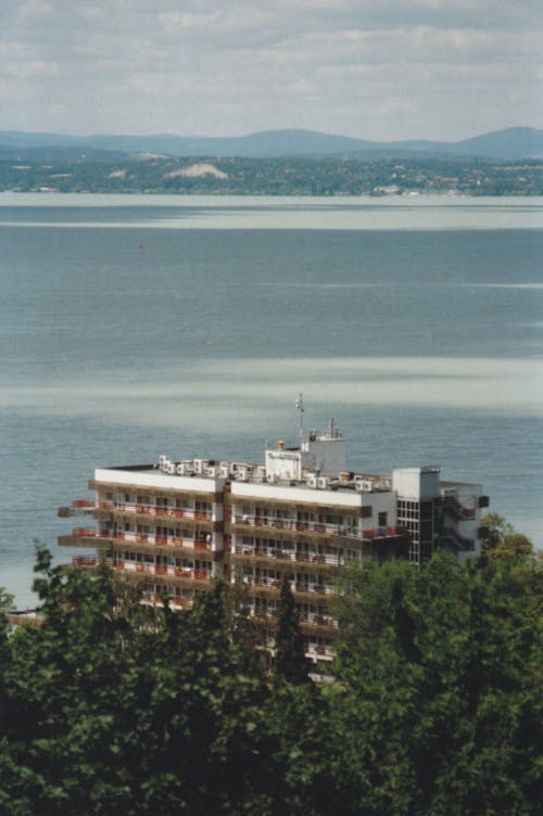 View of Hotel with Lake in Background