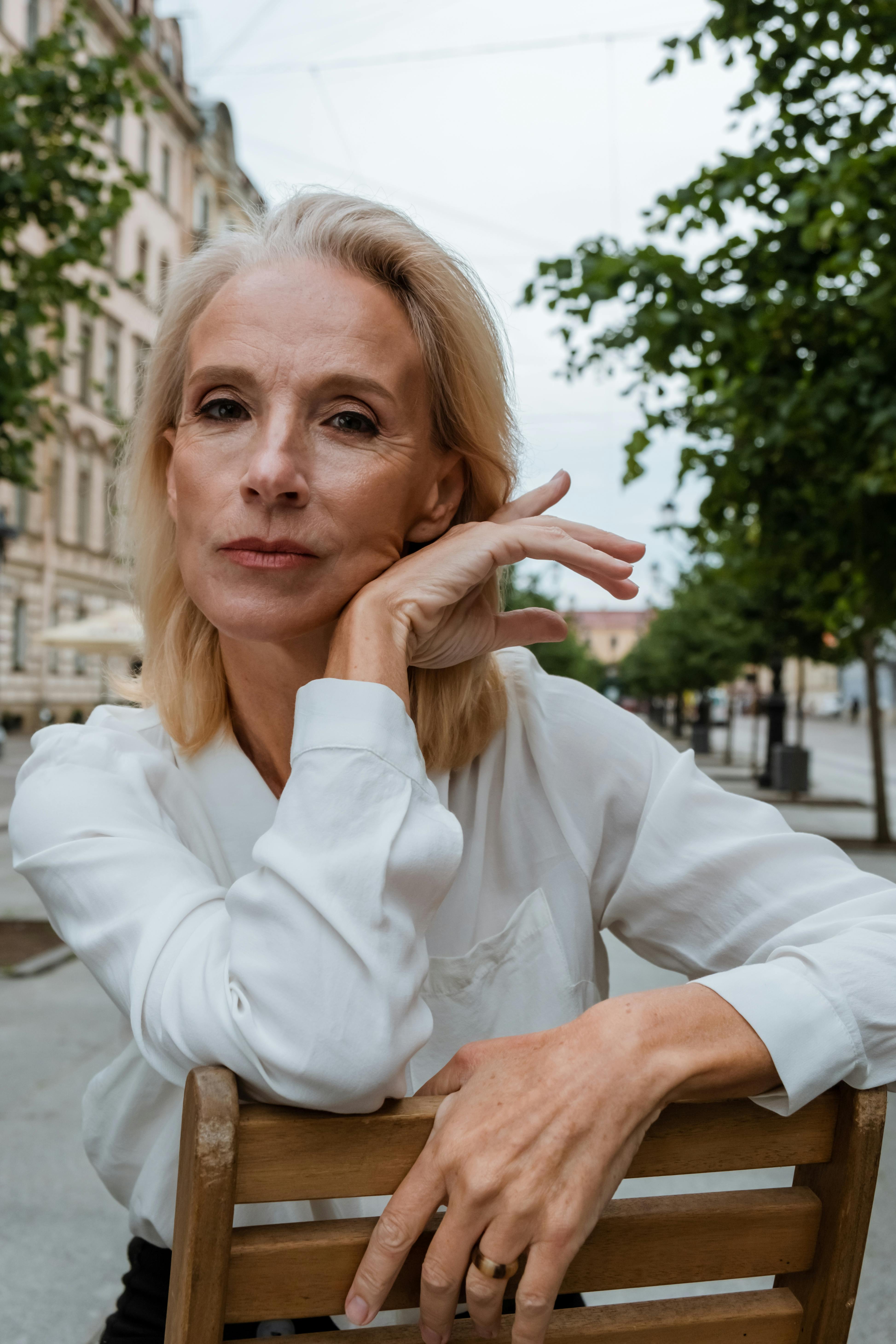 woman in white long sleeve shirt