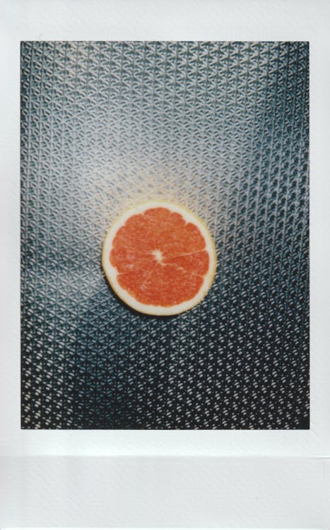 Grapefruit on Metal Surface