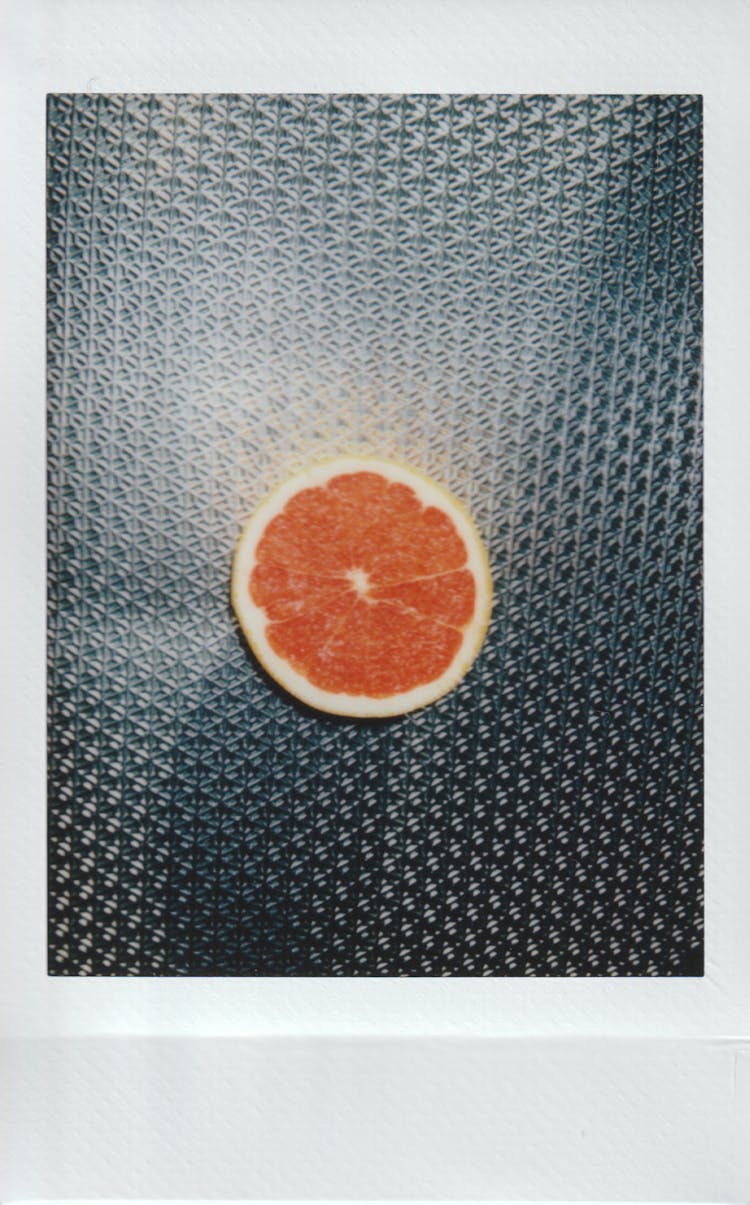 Grapefruit On Metal Surface