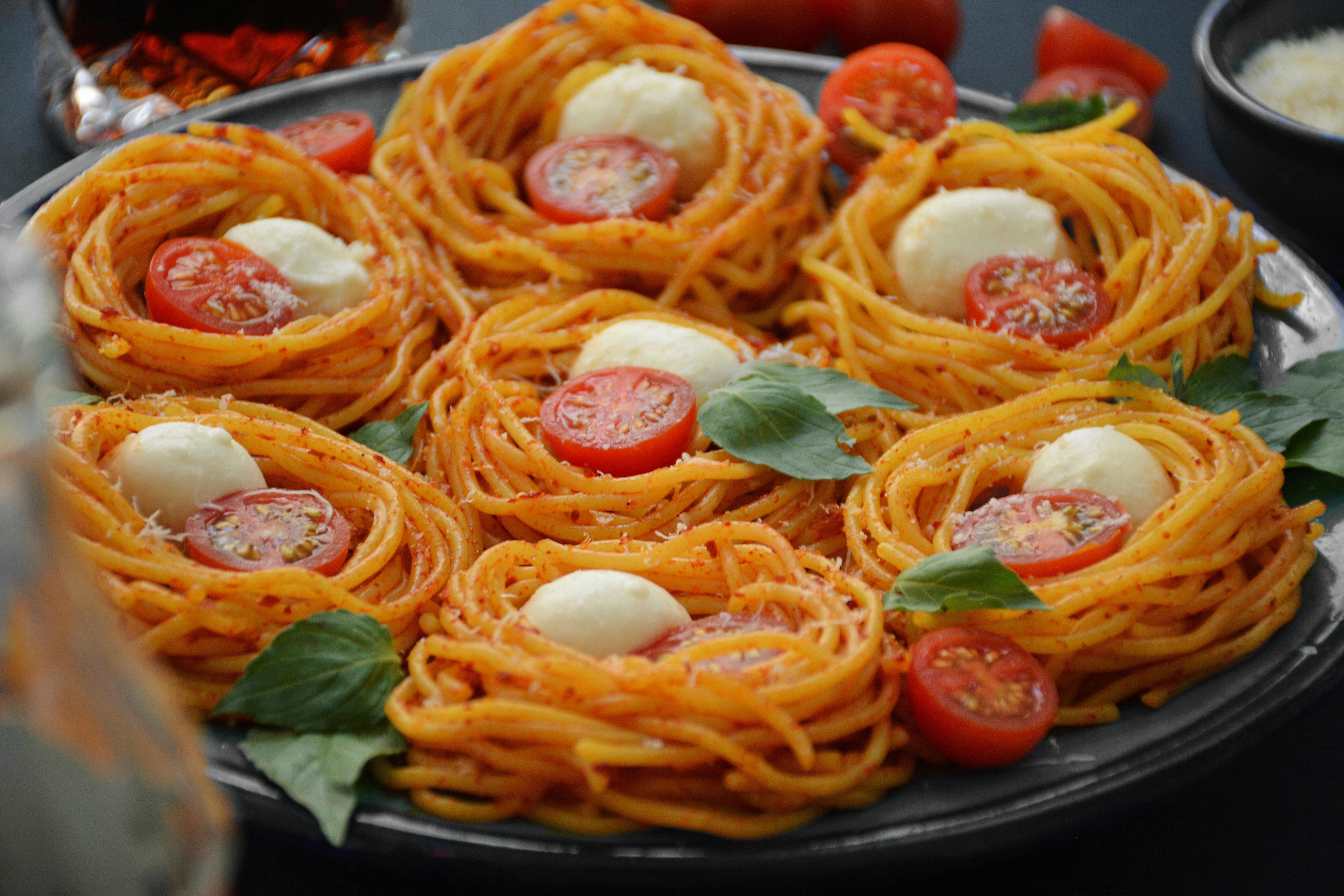 delicious spaghetti with fresh cherry tomatoes and cheese for lunch