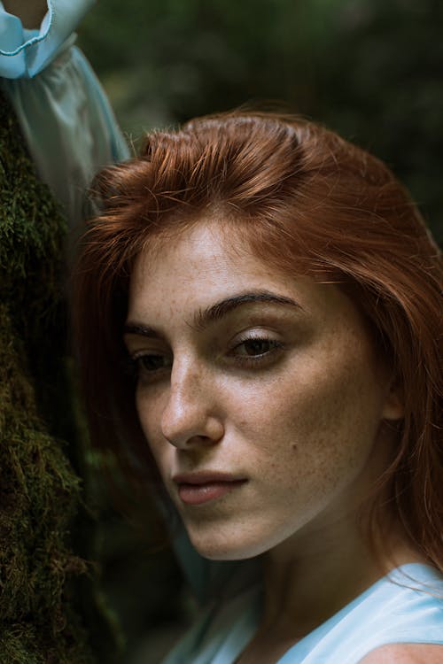 Portrait of a Woman with Freckles and Red Hair