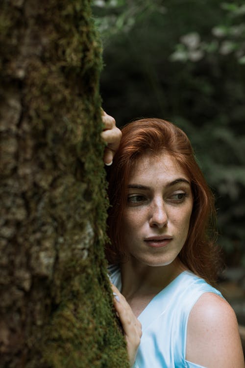 Portrait of a Woman with Red Hair Looking Sideways