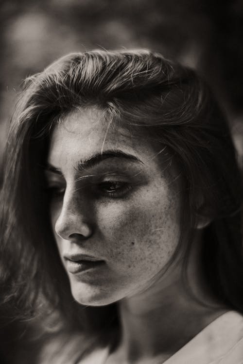 Free Portrait of a Woman with Freckles Stock Photo