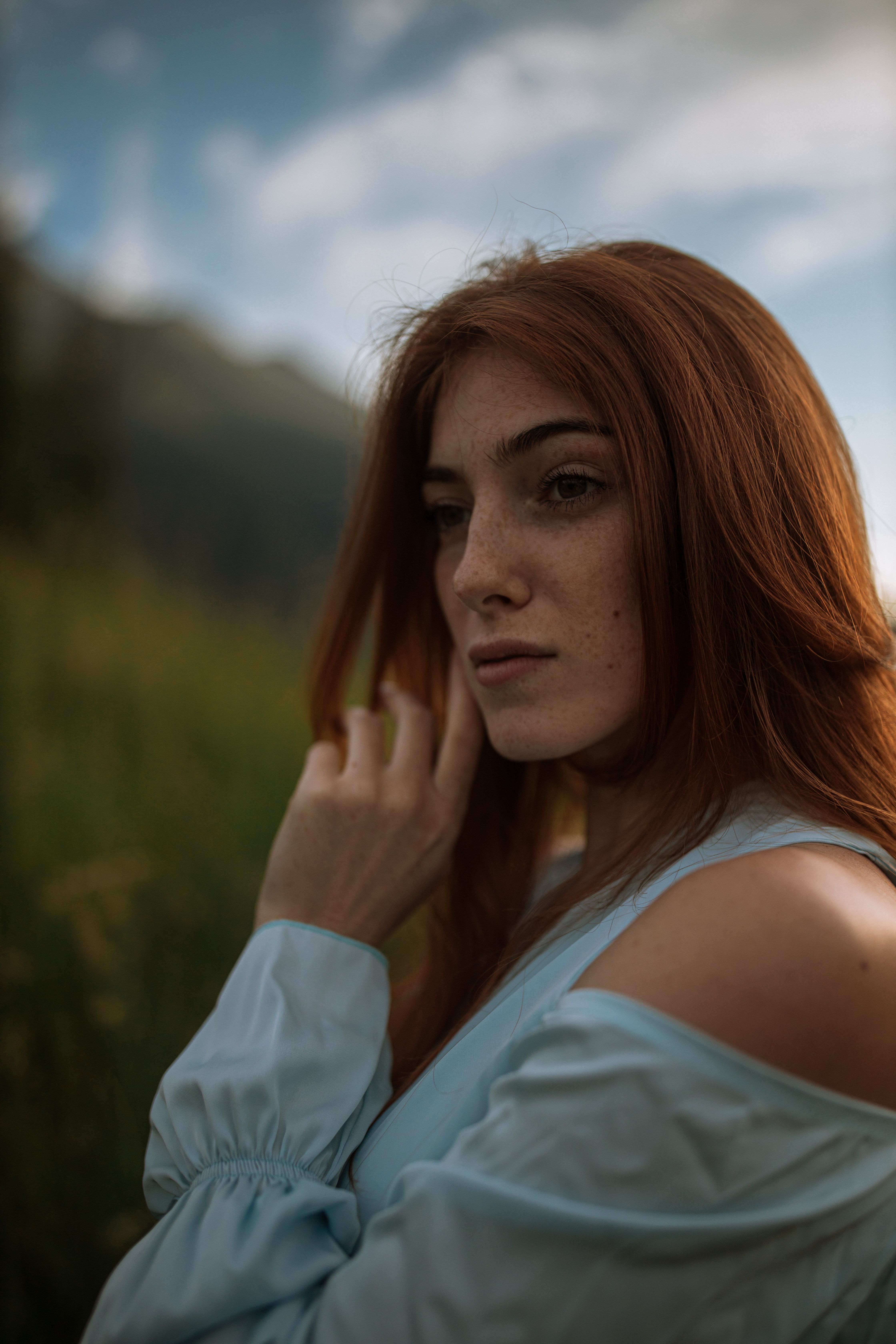 Portrait of a Beautiful Woman with Red Hair · Free Stock Photo