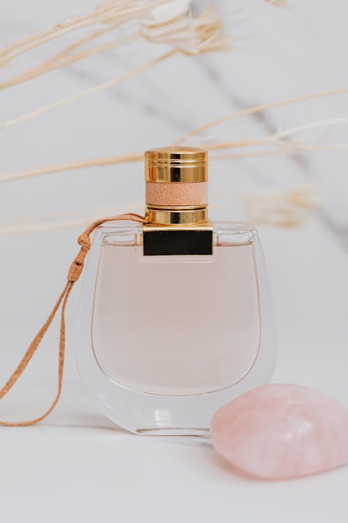 Glass Bottle of Pink Perfume