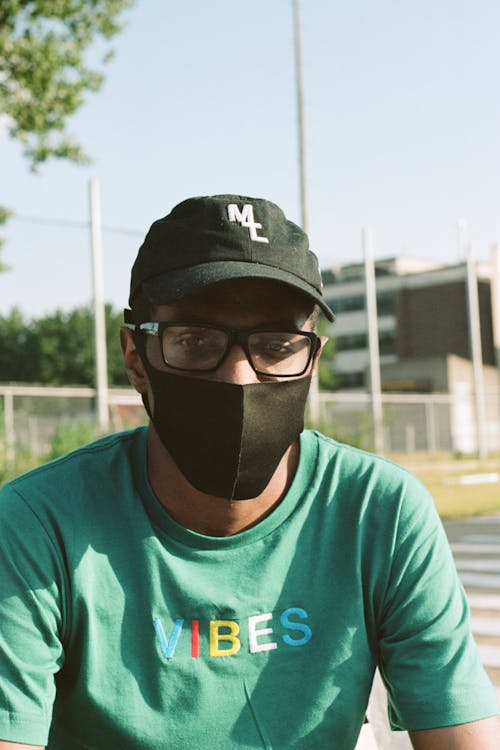 Man in Black Cap Wearing Face Mask