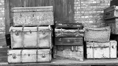 Grayscale Photo of Wooden Crates