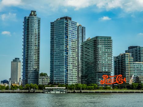 City Skyline Across Body of Water