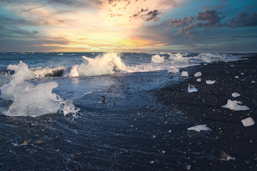 Blocks of Ice on the Shore of a Sea