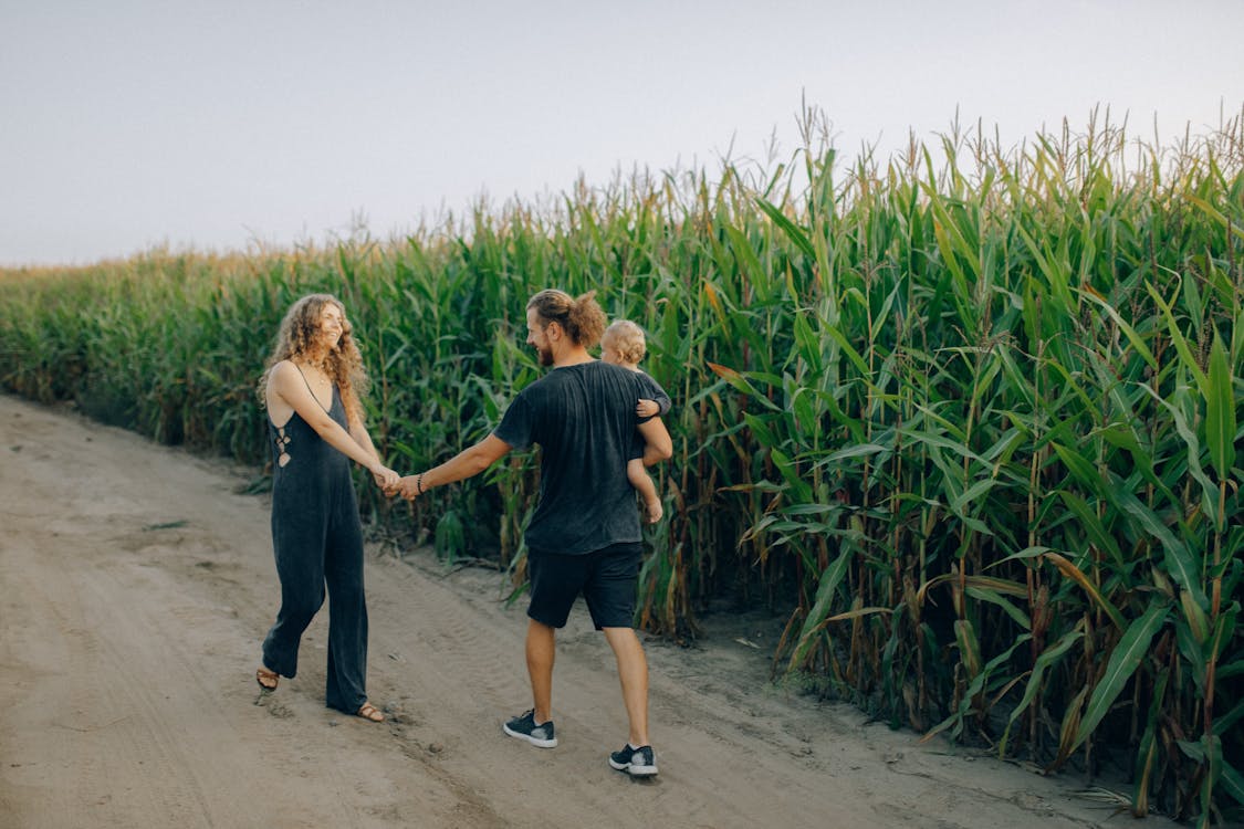 Free Family Walking Together Outdoors Stock Photo