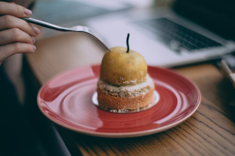 Crop Unrecognizable Woman Eating Delicious Peach Dessert