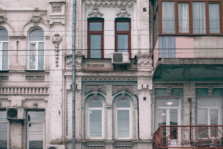 Facade Of Old Stone Building In Classic Style