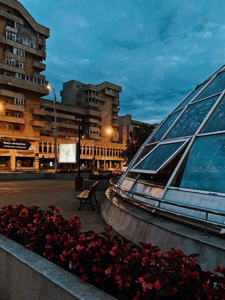 City Street With Old Building And Spherical Construction At Dusk