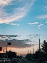 City road with moving cars at dusk