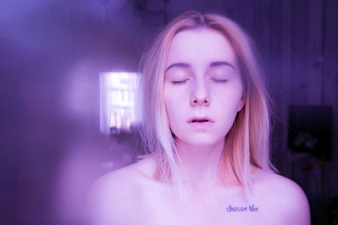 Free Blond model with closed eyes Stock Photo