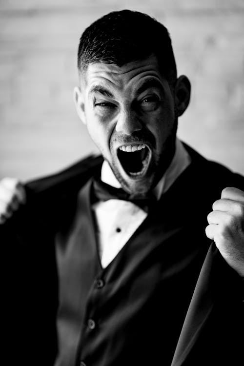  Man in Black Suit Screaming