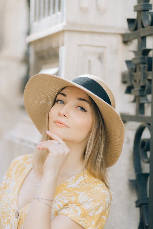 Free Attractive Woman Wearing a Sun Hat Stock Photo