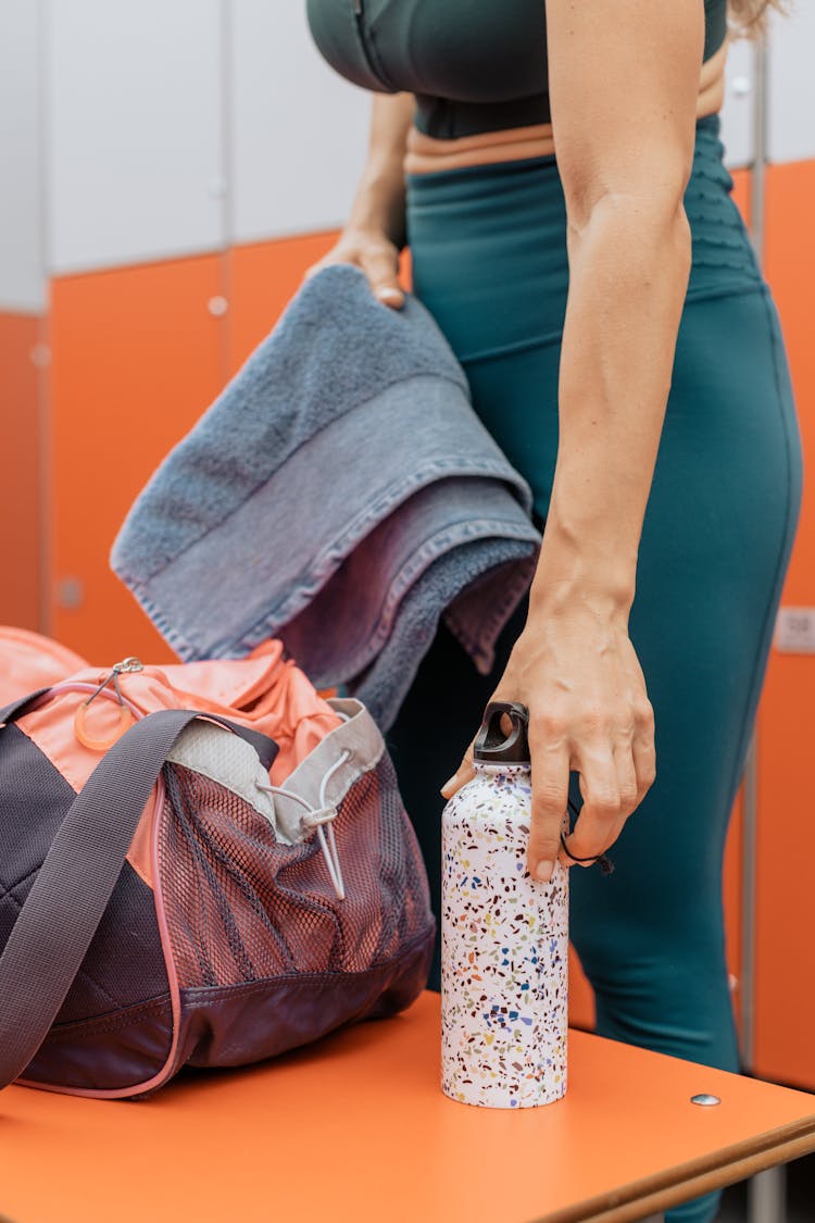 Woman Holding A Tumbler