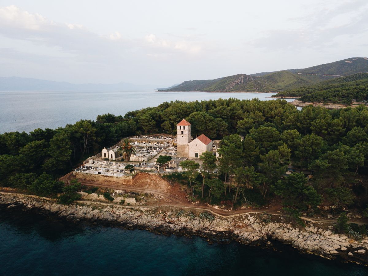 Aerial view of historic church along the Hvar coastline