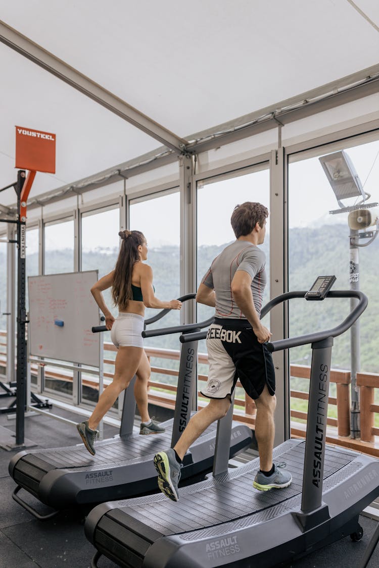 Man And Woman On A Treadmill