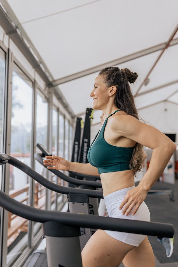 Person running on a treadmill during a heart stress echocardiogram exercise test
