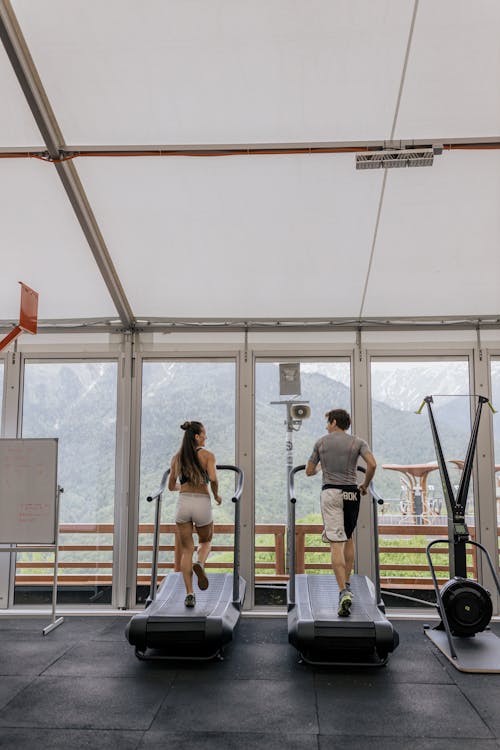 Man and Woman on Treadmill