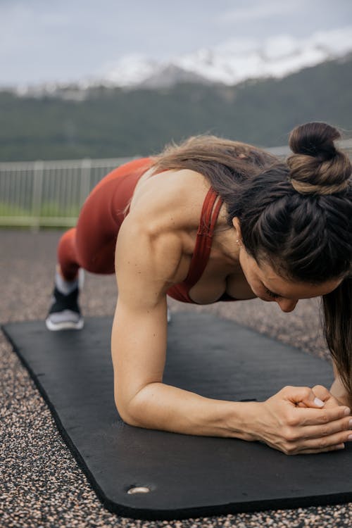 Woman Planking on a Yoga Mat