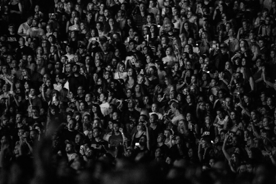 A massive crowd cheering at a Soldier Field concert under the night sky - live music chicago august 2025 A massive crowd cheering at a Soldier Field concert under the night sky - live music chicago august 2025