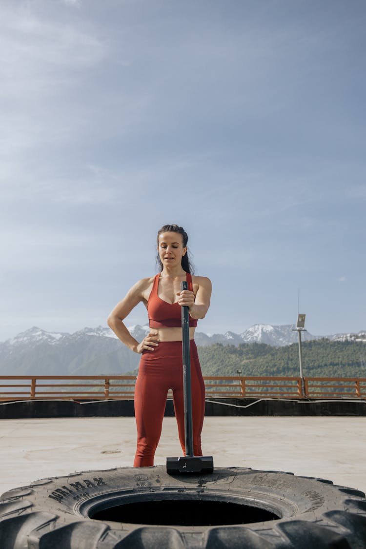 A Woman Holding A Hammer