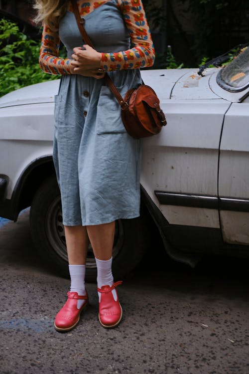 Woman Legs next to Car