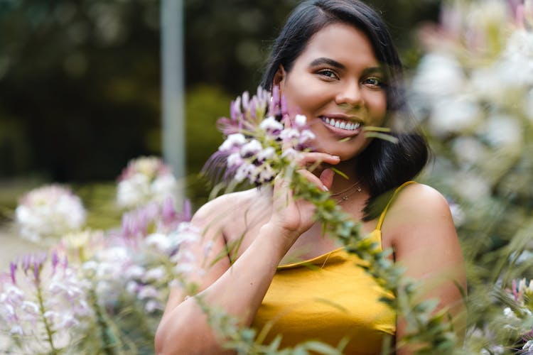 Joyful Ethnic Woman In Garden