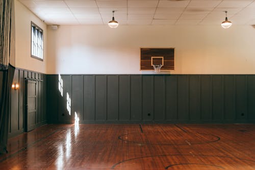 Interior of indoors basketball court in sports center