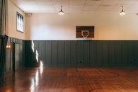 Interior of indoors basketball court in sports center