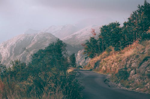 Narrow road in mountainous terrain