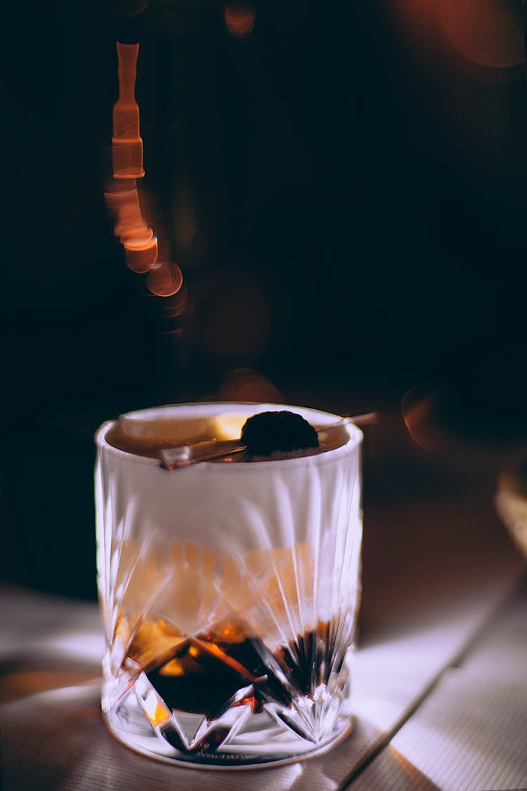 Alcohol Drink In Glass On Table