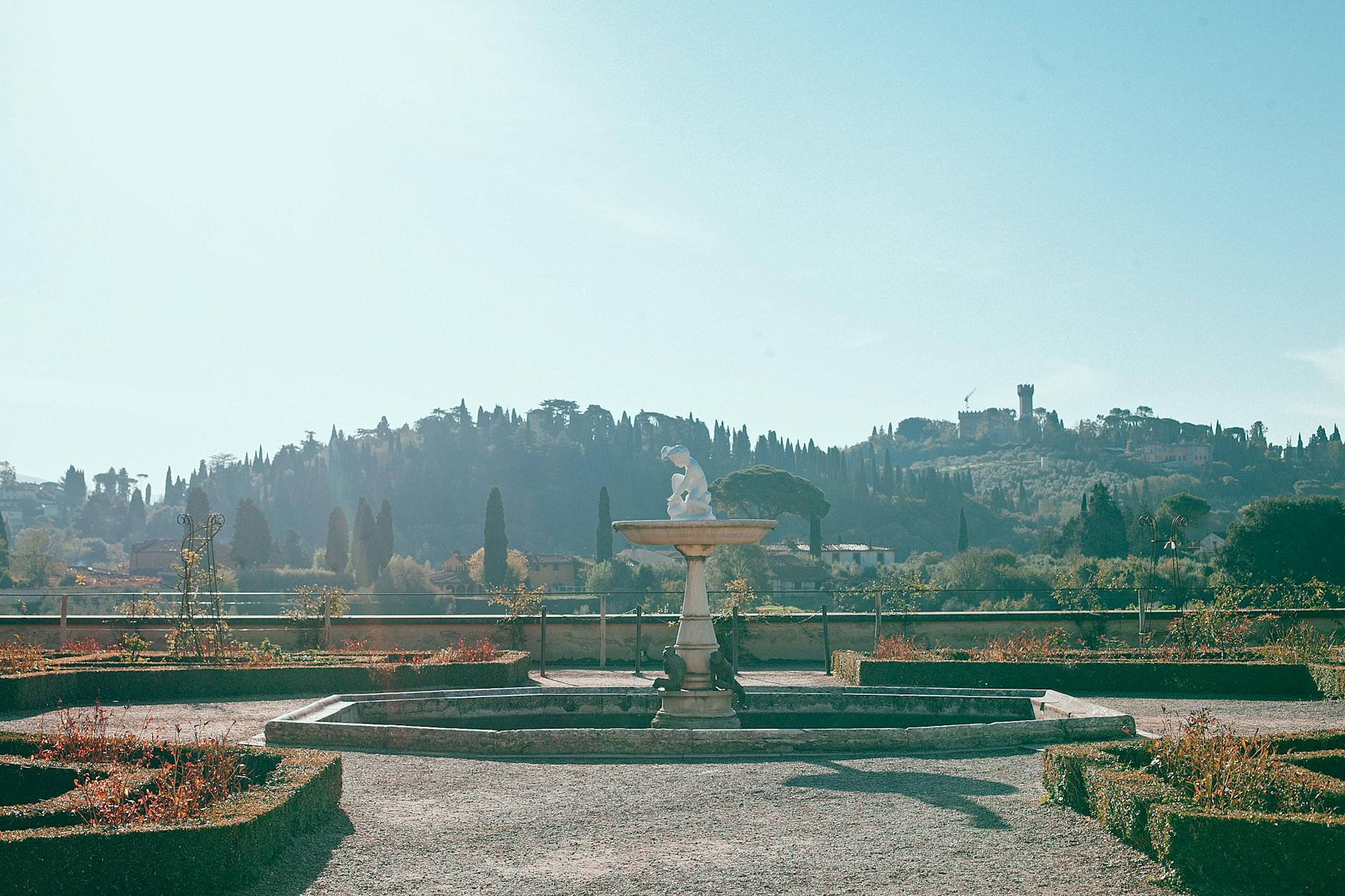 Old stone fountain with sculpture