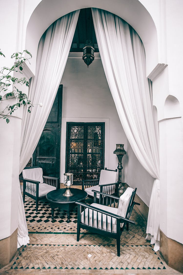 Terrace Of Villa With Chairs Around Table