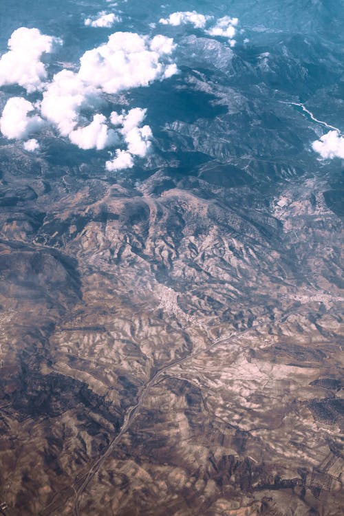 Clouds over high tops in mountainous terrain