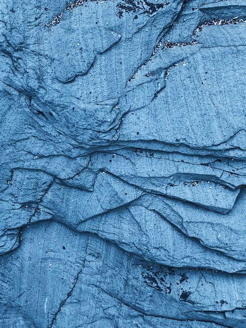 From above of abstract background of rough surface in rocky terrain in dusk