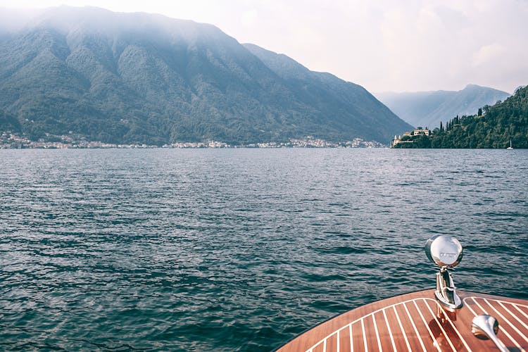 Deck Of Boat On Lake Against High Mountains