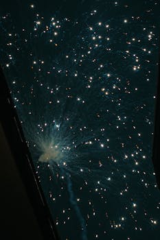 Captivating display of fireworks lighting up the night sky, creating a mesmerizing spectacle.